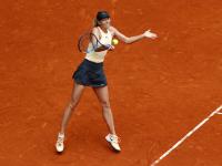 九游体育- 李娜与莎拉波娃正在进行第一局对决 